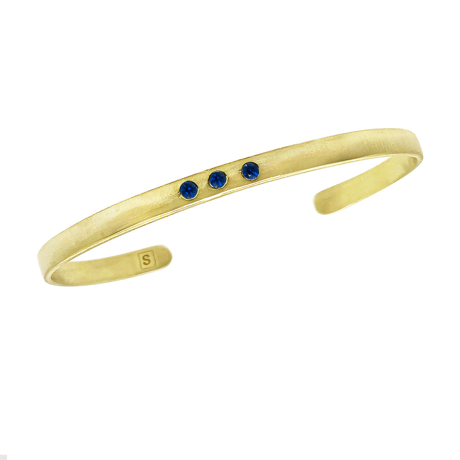 14-karat-yellow-gold-bracelet-Sapphire-Health-Wealth-Happiness-collection-designed-by-Susanne-Siegel-Fine-Jewelry