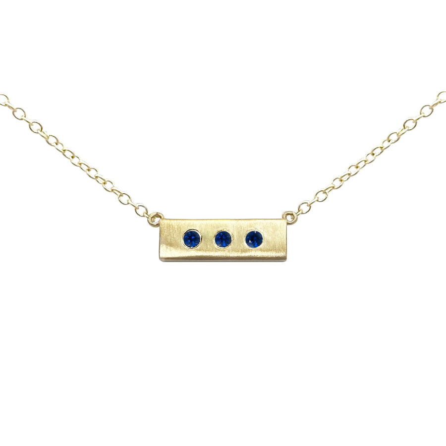 14-karat-yellow-gold-necklace-Sapphire-Health-Wealth-Happiness-collection-designed-by-Susanne-Siegel-Fine-Jewelry