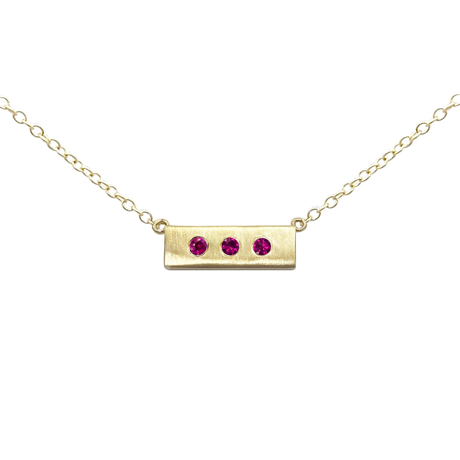 14-karat-yellow-gold-necklace-Ruby-Health-Wealth-Happiness-collection-designed-by-Susanne-Siegel-Fine-Jewelry