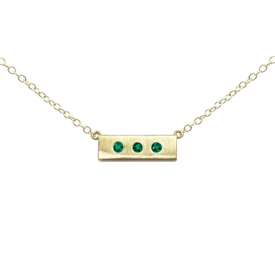 14-karat-yellow-gold-necklace-Emerald-Health-Wealth-Happiness-collection-designed-by-Susanne-Siegel-Fine-Jewelry